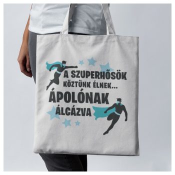   A szuperhősök köztünk élnek... ÁPOLÓNAK álcázva - feliratos fehér vászonszatyor 